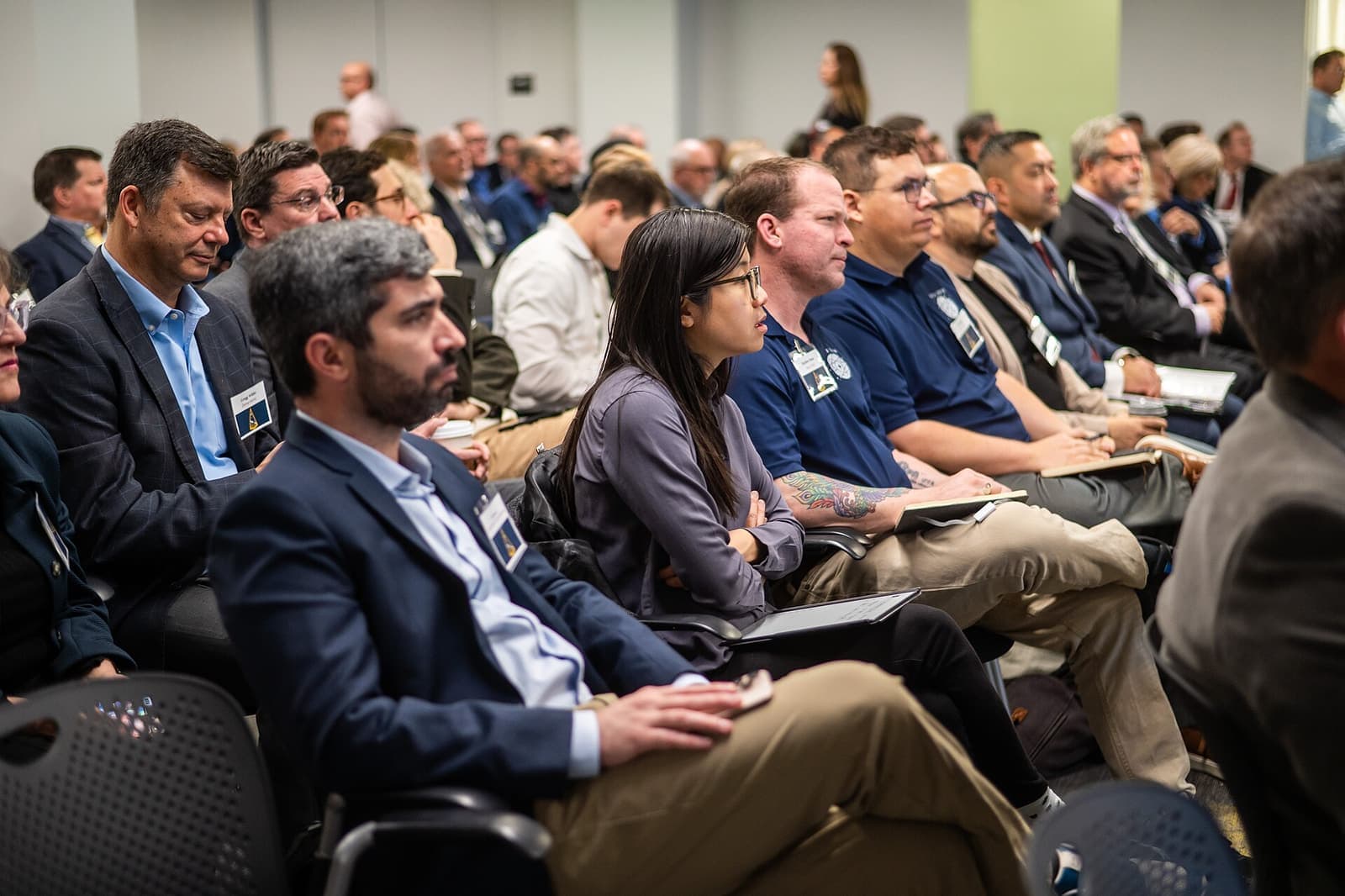 People talking at a networking reception